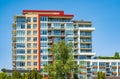 Facade of new residential townhouses. Apartment buildings in Canada. Modern complex of apartment buildings in summer Royalty Free Stock Photo