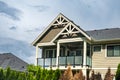 Facade of new residential townhouses. Top of a modern complex of apartment buildings. Real Estate Exterior Front House Royalty Free Stock Photo