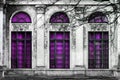 Facade of old abandoned building with three large arched windows Royalty Free Stock Photo
