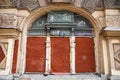 The facade of the old administrative buildings are boarded up, closed the window in the wall Royalty Free Stock Photo