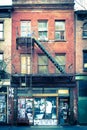 Facade of old brick apartment building Royalty Free Stock Photo