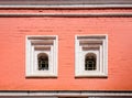 An old red brick wall with two Windows Royalty Free Stock Photo