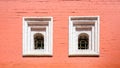 An old red brick wall with two Windows Royalty Free Stock Photo