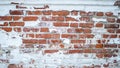 The facade of an old building. Texture of a red brick wall. Background painted with cracked white paint Royalty Free Stock Photo