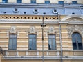 Facade of an old building. View from below on a tall building Royalty Free Stock Photo