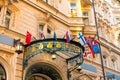 The facade of the old diplomatic building is decorated with flags of different countries