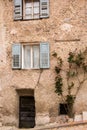 Facade of the old European house. Facade of old houses and stone staircase in Italy. Medieval house and door. Royalty Free Stock Photo