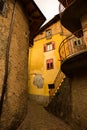 Facade of the old European house. Facade of old houses and stone staircase in Italy. Medieval house and door. Royalty Free Stock Photo