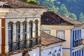 Facade of old and historical houses built in colonial architecture Royalty Free Stock Photo