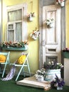 Facade of the old house in bright colors decorated with flowers vintage Royalty Free Stock Photo