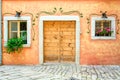 Facade of an old house with door and window Royalty Free Stock Photo