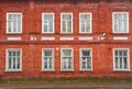 Facade of old red brick house Royalty Free Stock Photo