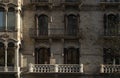 Facade of an old residential building with beautiful sculptural decorations