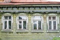 facade of the old Russian village wooden house with carved ornaments elements Royalty Free Stock Photo
