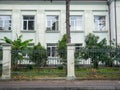 Facade of an old soviet house. Soviet duplex. USSR architecture. Courtyard of the southern city