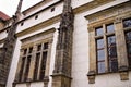 Facade of an old stone building with framed black windows Prague, Czech Republic
