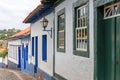 Facade of old street and houses in colonial style Royalty Free Stock Photo