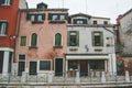 Facade of old venetian building along the Grand Canal. Architecture and landmarks of Venice. Italy, Europe. Royalty Free Stock Photo