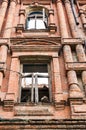 The facade of an old wooden dilapidated house