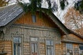 Facade of an old wooden house in brown color