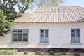 facade one white old brick house with windows Royalty Free Stock Photo