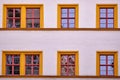 Facade with orange framed windows Royalty Free Stock Photo