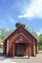 The facade of an Orthodox church with a dome engraved with a gilt  cross Royalty Free Stock Photo