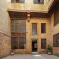 Facade of ottoman era historic house of Moustafa Gaafar Al Seleehdar, Cairo, Egypt, with interleaved wooden windows Mashrabiya