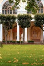 The facade of the Palace, photographed from the Park.autumn leaves on the green grass in front of the Palace Royalty Free Stock Photo