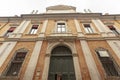 Facade of palazzo schifanoia showing windows and main door in ferrara