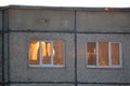 Facade of panel house. Gleam the window. Soviet architectural style. Residential building with five floors