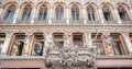 Facade of Passage, a historical building with baroque statues, sculptures and ornaments in the old town of Odessa Royalty Free Stock Photo