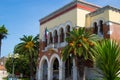 Facade of the picturesque Town Hall of Porec also called Parenzo, Croatia, with palms on the front part