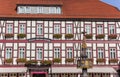 Facade with pink flowers at the market square of Wernigerode