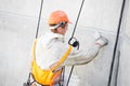 Facade Plasterer worker at work