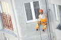 Facade Plasterer worker at work Royalty Free Stock Photo