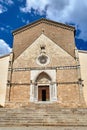 Facade and portal of a stone, medieval church