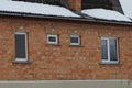 Facade of a private house from a red brown brick wall Royalty Free Stock Photo