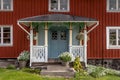 Facade of a red cottage on the island Harstena Sweden