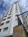 Facade of a residential building on Aclimacao district, Sao Paulo city, Brazil. Apartment condo in downtown. Real estate property.