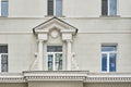 A facade of a residential building built in 1955 in the neoclassical style.