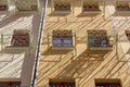 Facade of a residential building with small balconies in front of the window Royalty Free Stock Photo