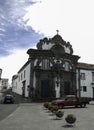 Facade of the Roman Catholic church of Espirito Santo in the center of the city of Ribeira Grande. At the bottom there are two Royalty Free Stock Photo