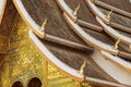 Facade and roof decoration of the Haw Pha Bang Buddhist temple at the Royal Palace Museum in Luang Prabang, Laos. Royalty Free Stock Photo