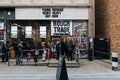 Facade of Rough Trade music shop in Brick Lane, East London, UK, people queue outside