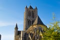 Facade of Saint Nicholas` Church Sint-Niklaaskerk in Ghent, Belgium, Europe, with green tree at the foreground during a sunny Royalty Free Stock Photo