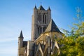 Facade of Saint Nicholas` Church Sint-Niklaaskerk in Ghent, Belgium, Europe, with green tree at the foreground during a sunny Royalty Free Stock Photo