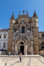 The Santa Cruz Monastery. Tourists and believers at the entrance. Coimbra, Portugal - August 20, 2019 Royalty Free Stock Photo