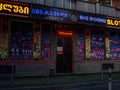 Facade of a small casino. Gambling in Batumi. Entrance to a gambling establishment. Bright sign