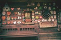 Facade of a small log house with colorful decorations. Royalty Free Stock Photo